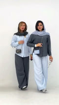 طقم نسائي أنيق من قطعتين – قميص واسع بأكمام طويلة مع بنطال فضفاض | إطلالة محتشمة وعصرية